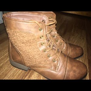 Selling brown combat boots